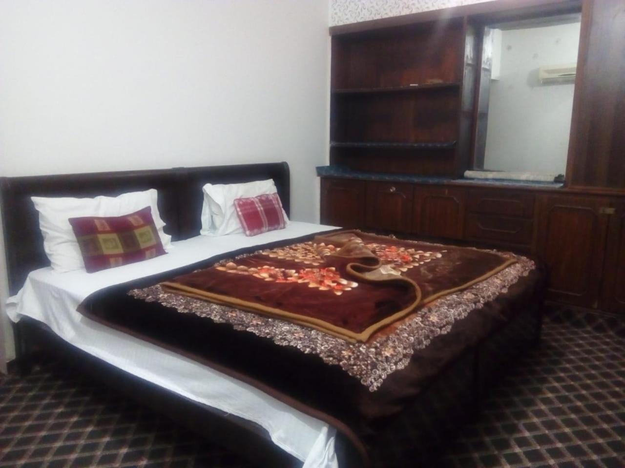 New City Lodges Guesthouse อิสลามาบัด ห้อง รูปภาพ