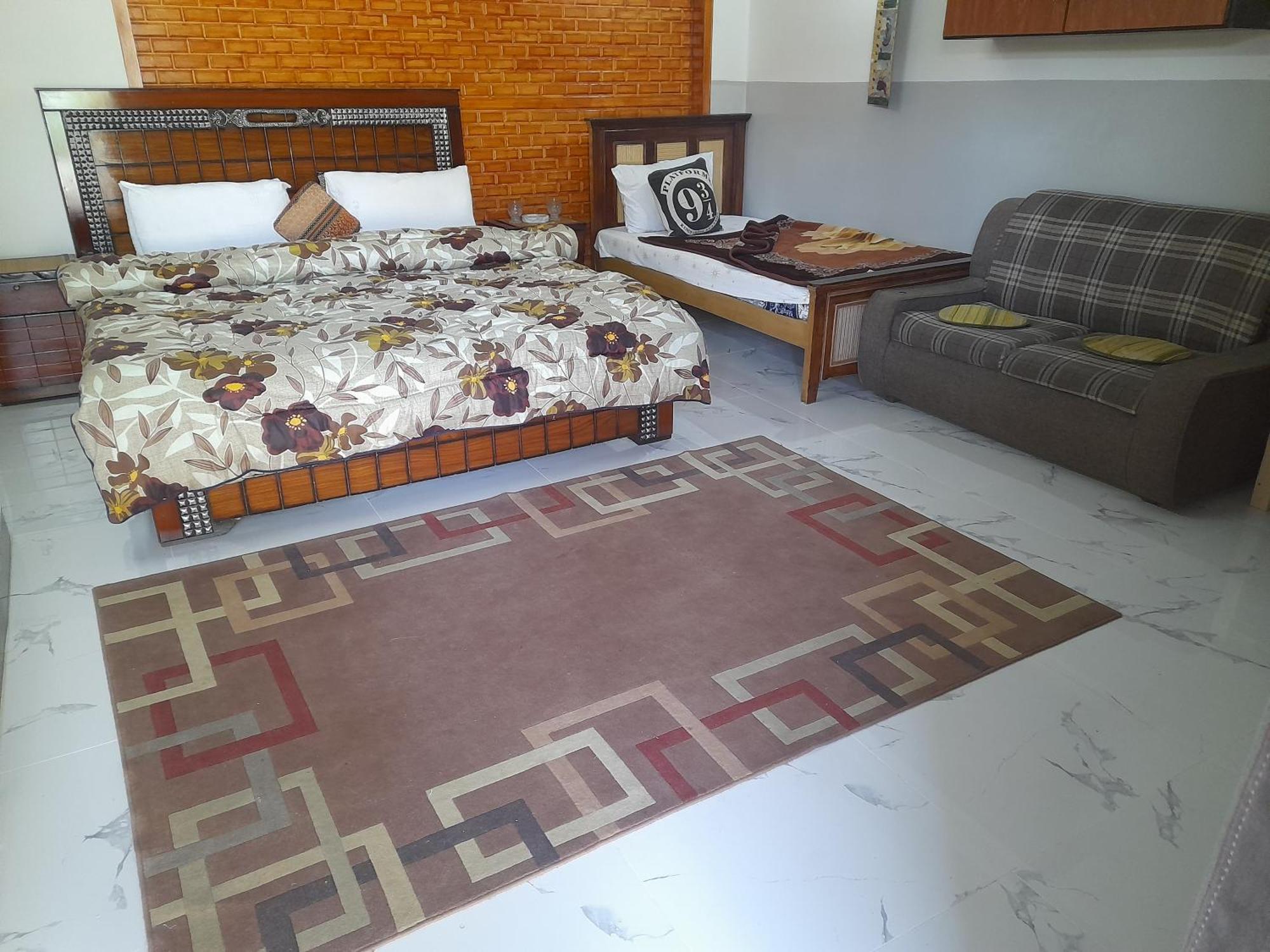 New City Lodges Guesthouse อิสลามาบัด ห้อง รูปภาพ